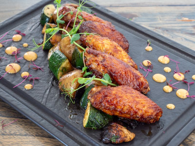 Sauced hot chicken tenders with wing snob signature heat